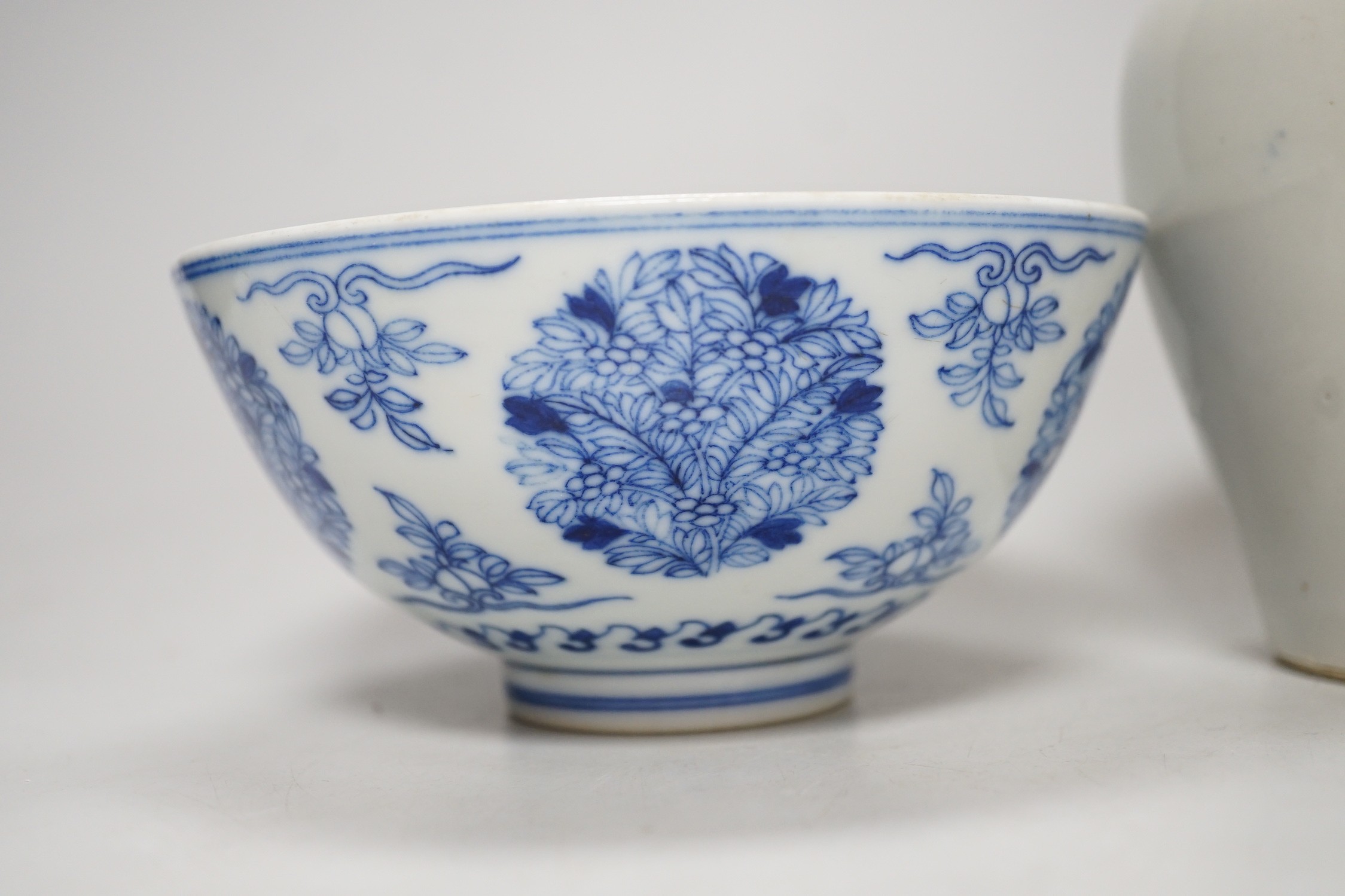 A Chinese underglaze copper red meiping a.f. and a Chinese blue and white bowl. Tallest 15cm